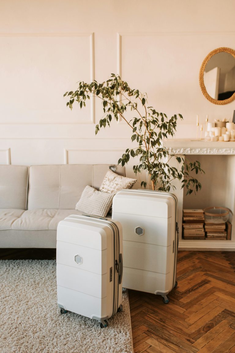 A stylish living room with packed luggage, ready for a travel adventure.